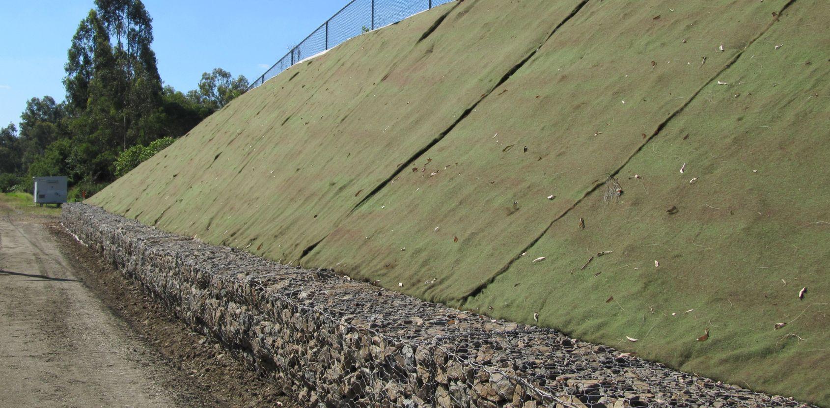Geosynthetics stabilise eroding rail embankment